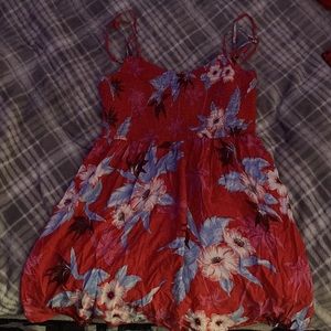 Red flower summer dress with a whole designed into the back.